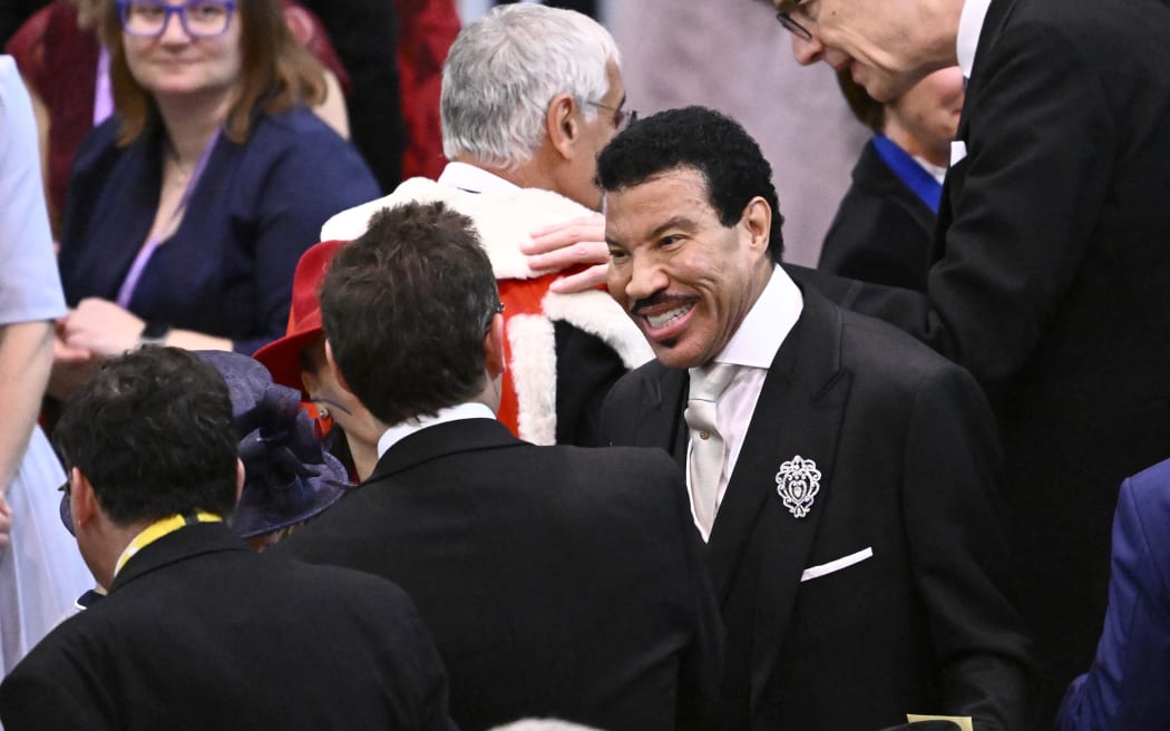 US pop star Lionel Richie arrives at Westminster Abbey in central London on May 6, 2023, ahead of the coronations of Britain's King Charles III and Britain's Camilla, Queen Consort. - The set-piece coronation is the first in Britain in 70 years, and only the second in history to be televised. Charles will be the 40th reigning monarch to be crowned at the central London church since King William I in 1066. Outside the UK, he is also king of 14 other Commonwealth countries, including Australia, Canada and New Zealand. Camilla, his second wife, will be crowned queen alongside him, and be known as Queen Camilla after the ceremony. (Photo by Gareth Cattermole / POOL / AFP)