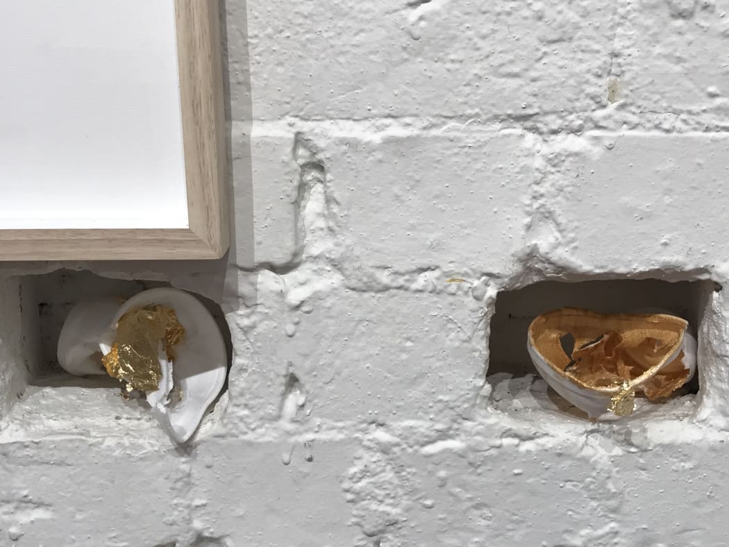 Medicine dispenser cups kept by Suzie and crafted into art for her exhibition Monuments of Hope, 2019.
