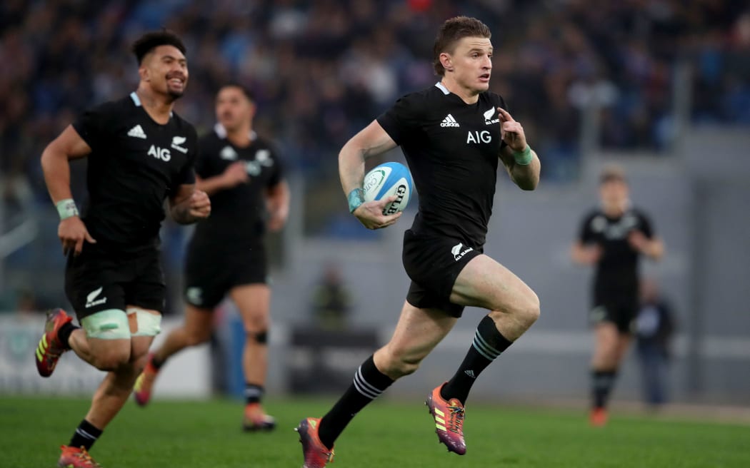 New Zealand's Beauden Barrett scores a try