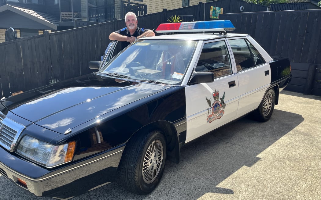 Stephen Parsons with the Mitsubishi V3000 he turned into a Ministry of Transport traffic cop car.
