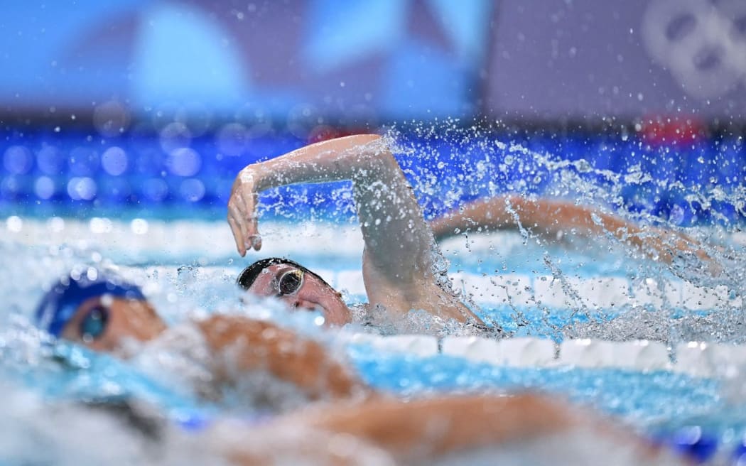 New Zealand's Erika Fairweather competes in  a heat of the women's 400m freestyle swimming event at the Paris 2024 Olympic Games at the Paris La Defense Arena in Nanterre, west of Paris, on July 27, 2024. (Photo by Jonathan NACKSTRAND / AFP)