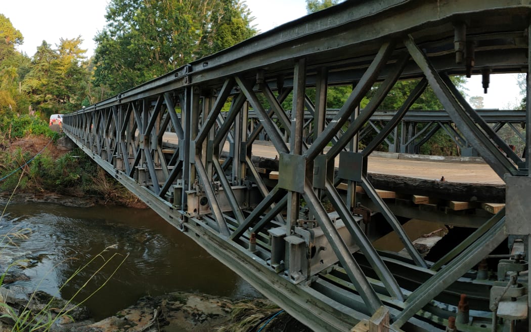 A bailey bridge has been installed between Mill Flat Road and Coatesville-Riverhead Highway in Auckland's Riverhead after severe flooding on 27 January washed away the existing bridge.