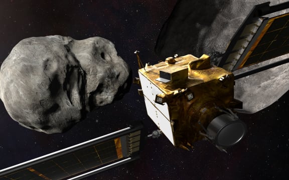 An illustration of the DART spacecraft prior to impact at the Didymos asteroid system.