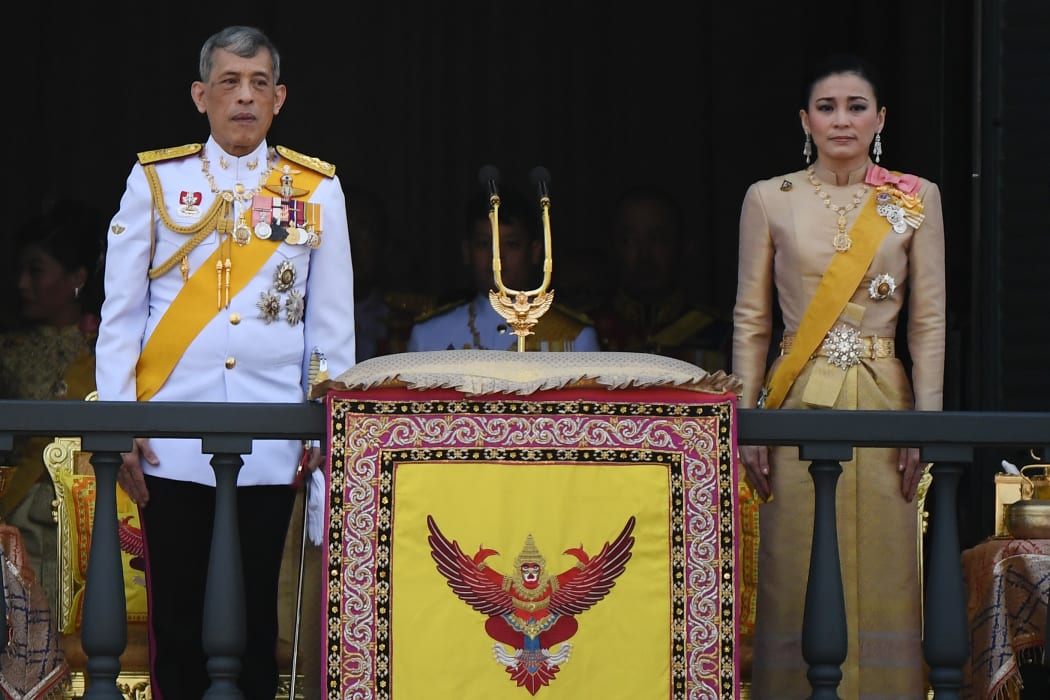 Thailand's King Maha Vajiralongkorn and Queen Suthida appear on the balcony of Suddhaisavarya Prasad Hall of the Grand Palace in May 2019.