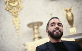El Salvador's President Nayib Bukele meets with US President Donald Trump (not pictured) during a bilateral meeting in the Oval Office of the WHite House in Washington, DC, APril 14, 2025. Trump on Monday hosted El Salvador's President Nayib Bukele, the self-described "world's coolest dictator" who is now the US leader's key ally in a controversial push to deport illegal migrants to a notorious Salvadoran prison. The meeting comes as the White House faces pressure over the case of a father who was mistakenly deported to the jail in the Central American country -- whose return a US court has ordered the Trump adminstration to facilitate (Photo by Brendan SMIALOWSKI / AFP)