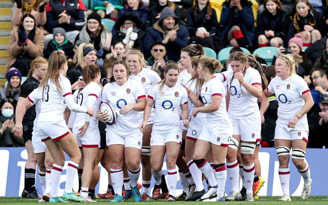 England's Amy Cokayne celebrates scoring a try against Black Ferns 2021.