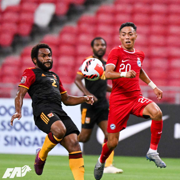 Action from the Singapore-Papua New Guinea game on Friday