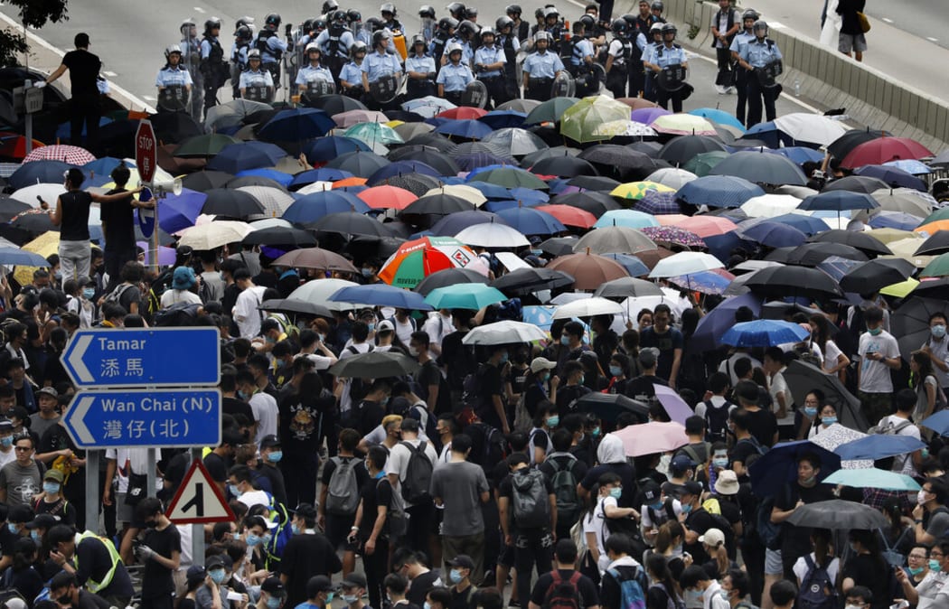 Protesters gather outside the Legislative Council in Hong Kong, Wednesday, June 12, 2019.