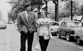 Movie still from the 1960 Jean-Luc Godard film Breathless featuring Jean-Paul Belmondo and Jean Seberg