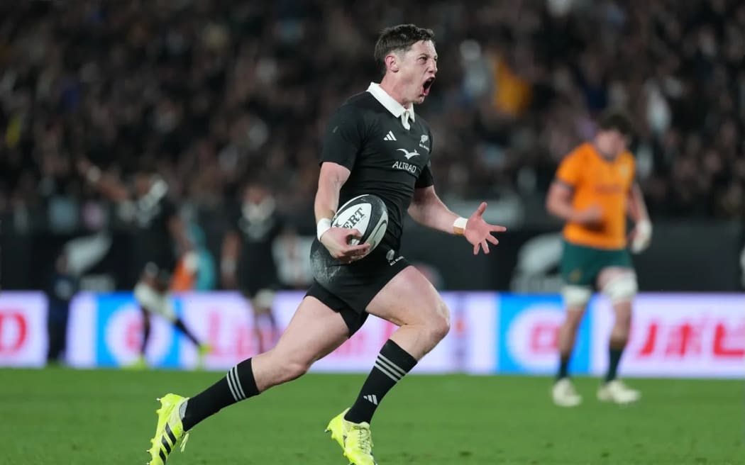 Cam Roigard scores against the Wallabies.