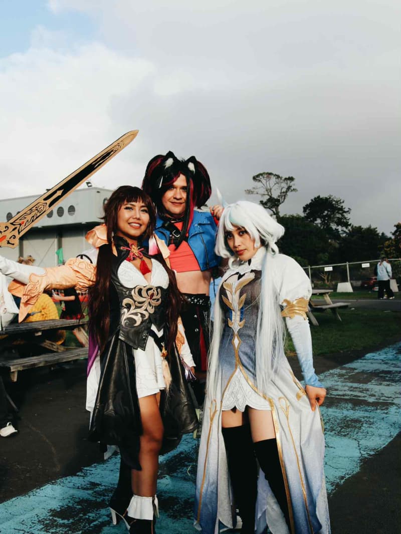Cosplayers at Armageddon winter expo on King's Birthday long weekend at Auckland Showgrounds. (L-R) Model Christine Marquez/Lambert as Li Sushang (Honkai: Star Rail), gamer/coder/cosplayer model as custom game character Bunzai Blade and a fellow gamner/model/actress in her Furina/Focalors (Genshin Impact) outfit.