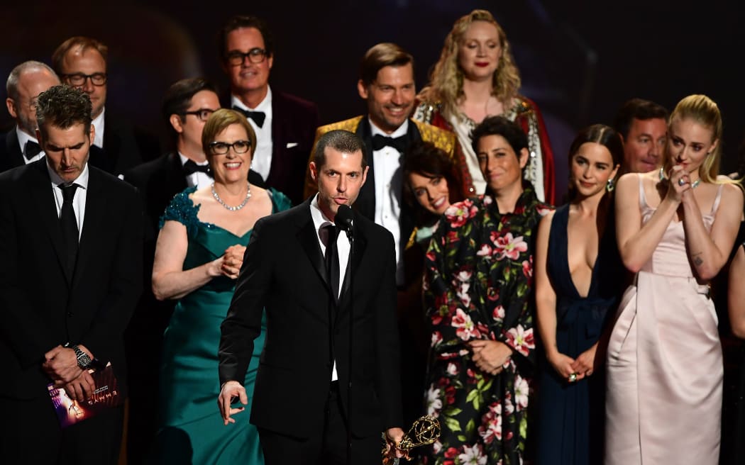 D.B. Weiss (C) and cast and crew of "Game of Thrones" accept the Outstanding Drama Series award onstage during the 71st Emmy Awards at the Microsoft Theatre in Los Angeles on September 22, 2019.