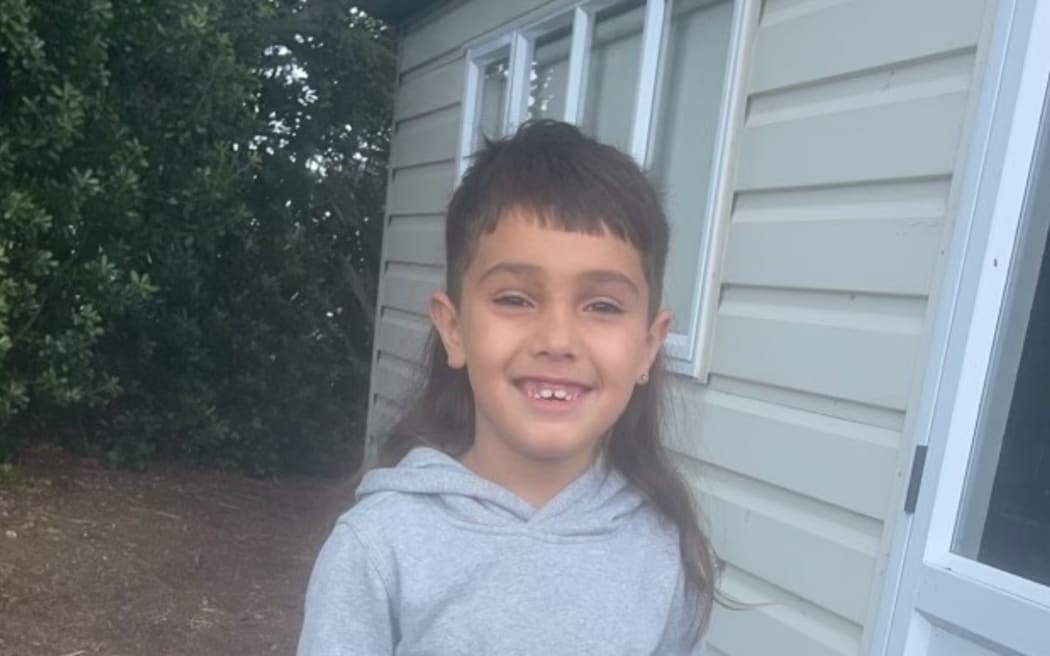 Azaiah Clausen, now 7, was attacked by a dog at a motel room when he was three.
