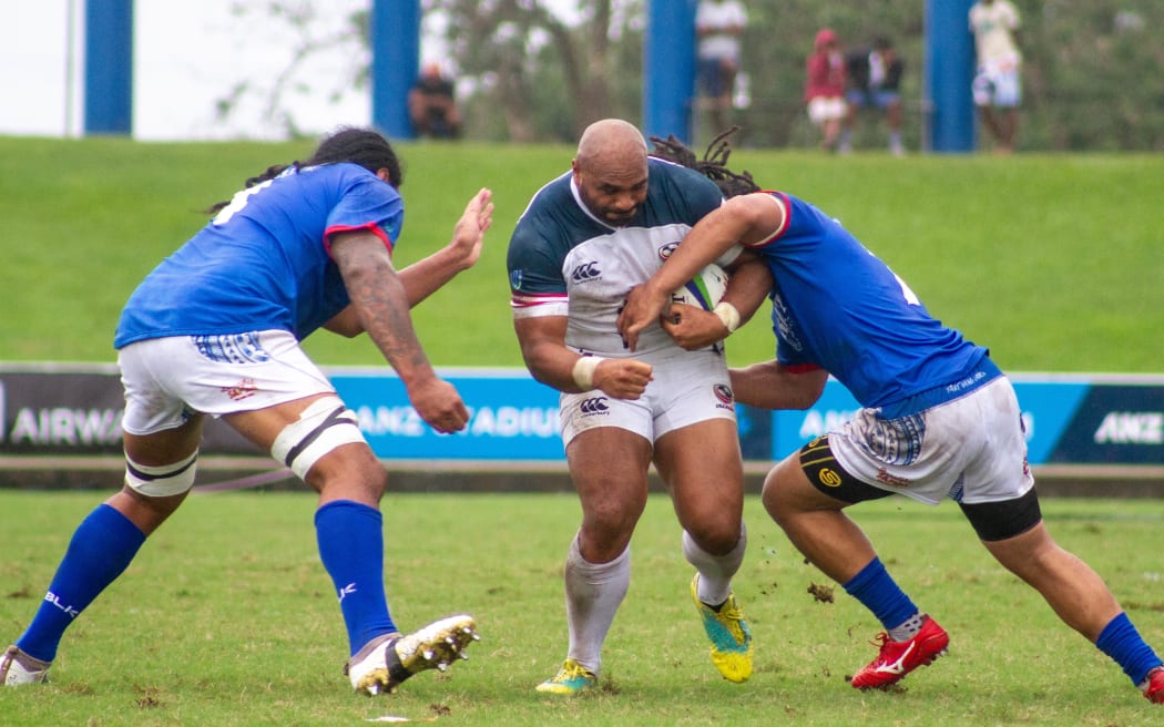 The USA take the ball up through the middle against Samoa in the second round of the World Rugby Pacific Nations Cup.