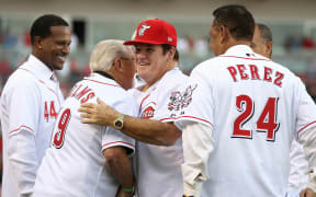 Pete Rose hugs Tommy Helms during the ceremony celebrating the 25th anniversary of his breaking the career hit record of 4,192 on September 11, 2010 at Great American Ball Park in Cincinnati.
Nicknamed "Charlie Hustle" for his hard-charging effort and dogged determination, the long-time hometown hero for the Cincinnati Reds died in Las Vegas.