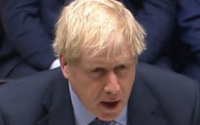 A video grab from footage broadcast by the UK Parliament's Parliamentary Recording Unit (PRU) shows Britain's Prime Minister Boris Johnson