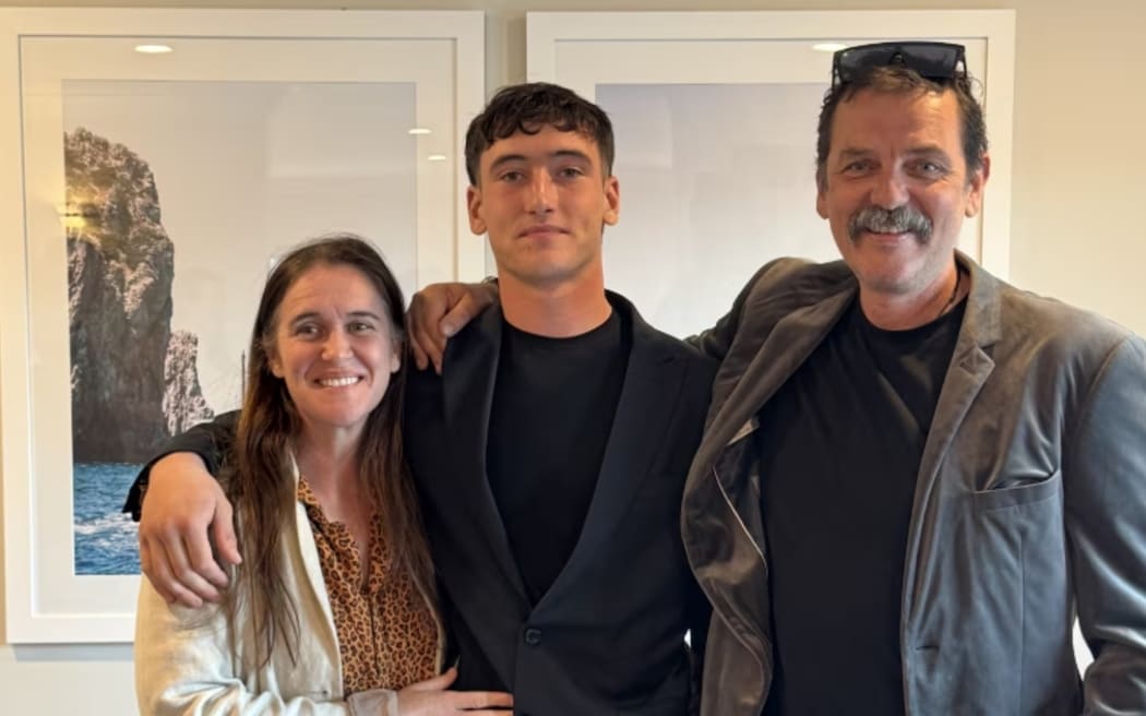 Warkworth teenager Silas Sims with his parents Sarah and Benjamin.