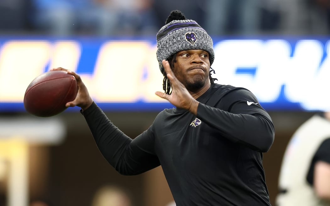 INGLEWOOD, CALIFORNIA - NOVEMBER 26: Lamar Jackson #8 of the Baltimore Ravens warms up prior to the game against the Los Angeles Chargers at SoFi Stadium on November 26, 2023 in Inglewood, California. (Photo by Katelyn Mulcahy/Getty Images)