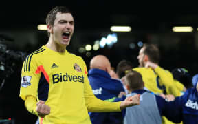 Adam Johnson of Sunderland celebrates victory.