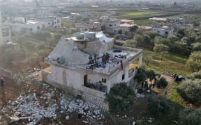 The aftermath of the raid by US special operations forces  which killed Islamic State leader Abu Ibrahim al-Hashimi al-Qurayshi in northwestern Syria.