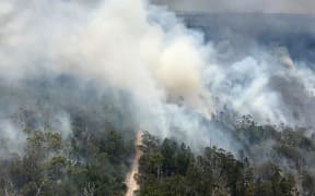 An aerial view of bushfires on Fraser Island, off Australia's east coast on November 29, 2020.
