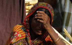 indian woman covering face