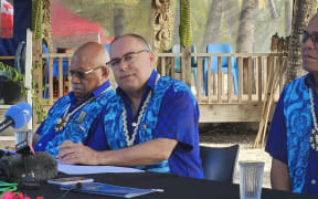 Mark Brown announcing the final outcomes in Aitutaki.
