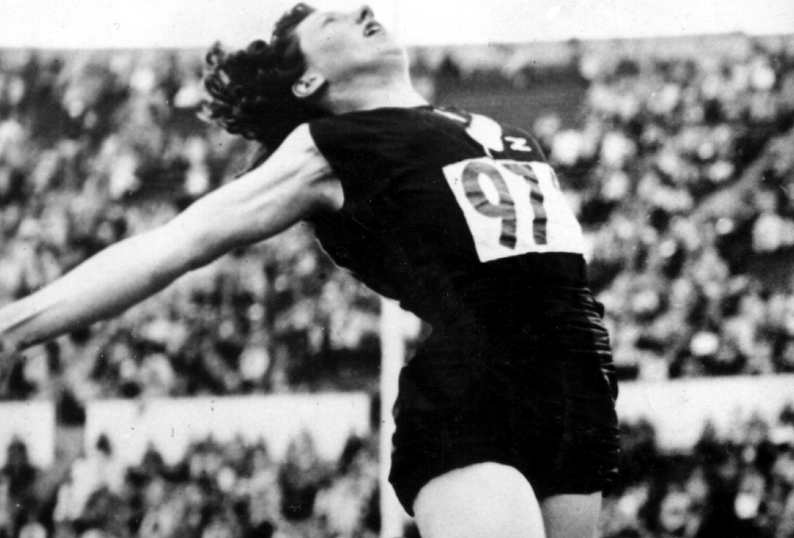 Yvette Williams jumps her way to an Olympic Gold medal with a jump of 6.24m. Helsinki Olympic Games, 1952.