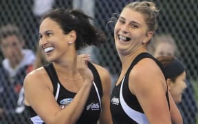 Black Sticks Kayla Whitelock (L) and Olivia Merry celebrate a goal