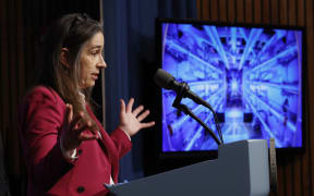 WASHINGTON, DC - DECEMBER 13: Lawrence Livermore National Laboratories Director Dr. Kim Budil speaks during a news conference with fellow administrators and scientists at the Department of Energy headquarters to announce a breakthrough in fusion research on December 13, 2022 in Washington, DC. The officials announced that experiments at the National Ignition Facility at the LLNL achieved 'ignition,' where the fusion energy generated equals the laser energy that started the reaction for the first time ever, a major advancement that may produce bountiful clean energy in the future.   Chip Somodevilla/Getty Images/AFP (Photo by CHIP SOMODEVILLA / GETTY IMAGES NORTH AMERICA / Getty Images via AFP)