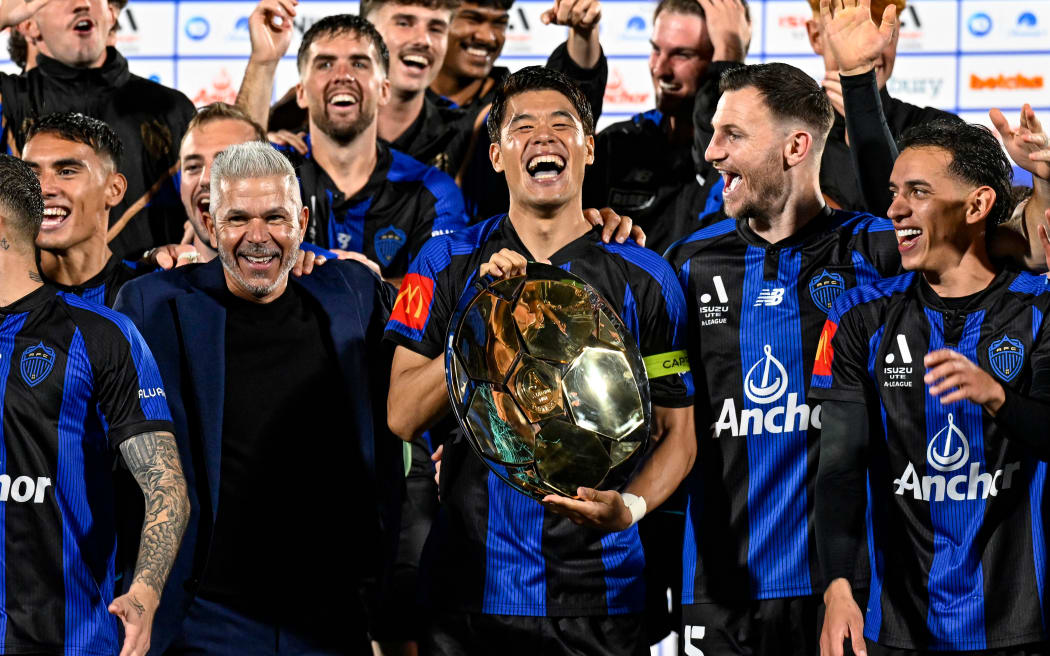 Auckland FC Manager Steve Corica and Hiroki Sakai of Auckland FC with the A-League Plate Trophy, 2025.