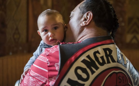 Tau Kopu-Edwards with his son.