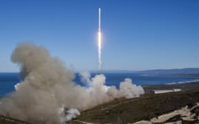 A Falcon 9 rocket lifting off from Vandenberg Air Force Base, California, on January 14, 2017
