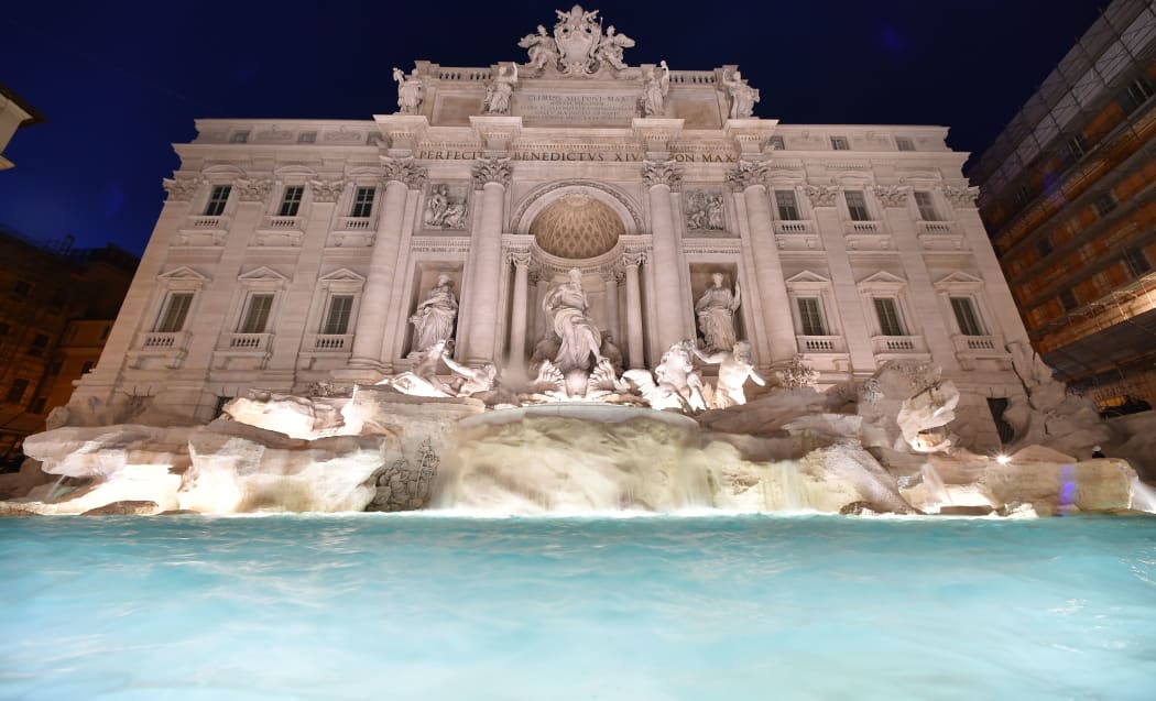 The restored Trevi fountain during its inauguration on November 3, 2015 in central Rome.