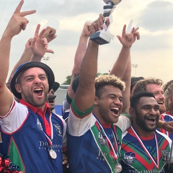 The Wan Papua Warriors celebrate winning the London Nines.