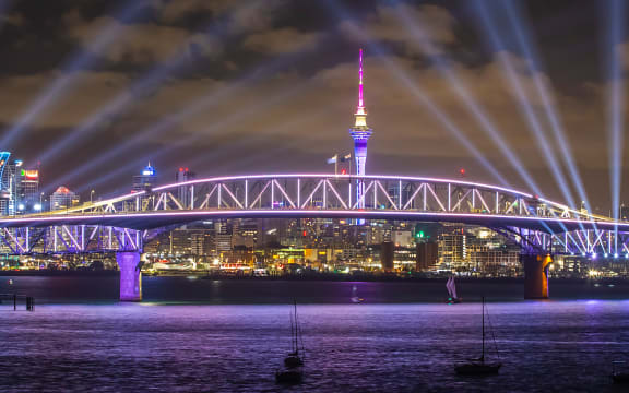 A light display replaced the traditional fireworks display from the Sky Tower in Auckland.
