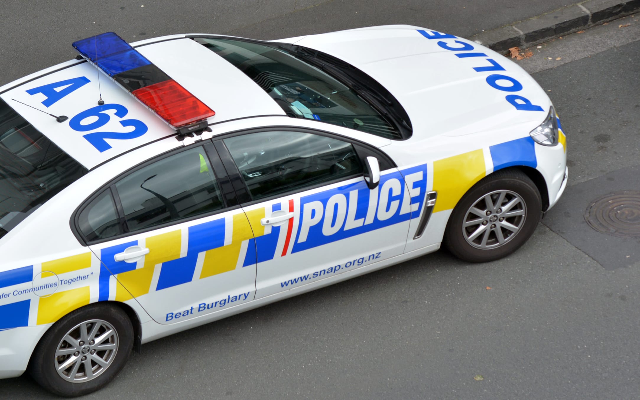AUCKLAND - MAR 30 2017:New Zealand Police car and officer during a crime respond in Auckland, New Zealand.