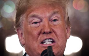 US President Donald Trump speaks during a post-election press conference in the East Room of the White House in Washington, DC on November 7, 2018. (Photo by Jim WATSON / AFP)