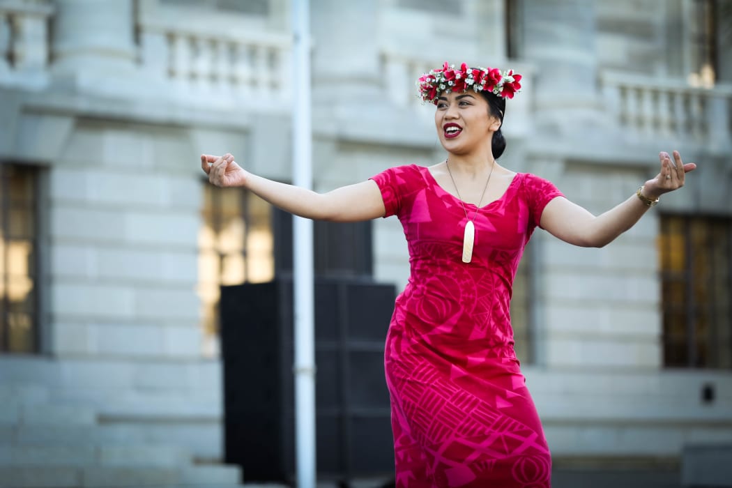 Brienela Tauira from the Cook Islands Community in Porirua dances at Parliament to commemorate the 125th anniversary of women's suffrage in New Zealand.