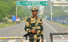 An Indian Border Security Force soldier stands guard near the India-Pakistan Wagah border post, about 35kms from Amritsar.