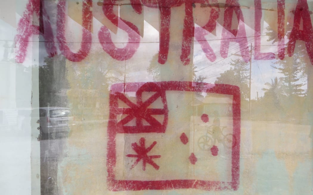A replica of the Australian flag painted on one of the houses in the central Balibo District in an attempt to provide protection for the five journalists.