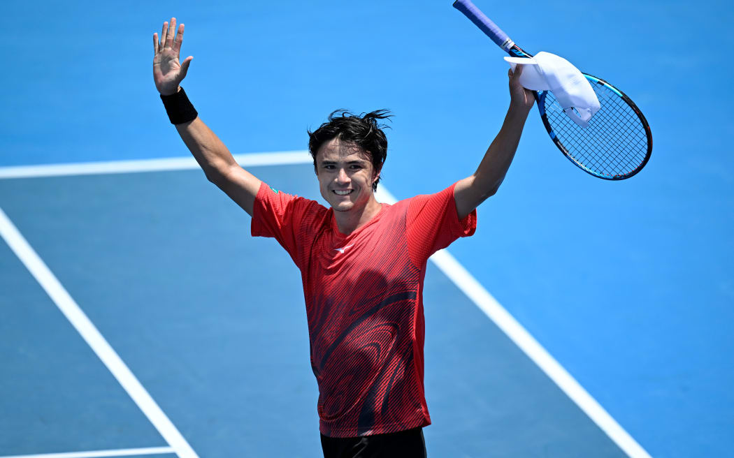 Taro Daniel of Japan thanks the fans after winning his 1/4 final singles match at the ASB Classic tennis tournament in Auckland.