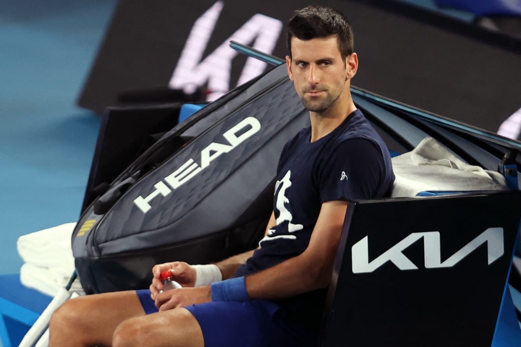 Novak Djokovic attends a practice session on 14 January 2022 ahead of the Australian Open tennis tournament in Melbourne.