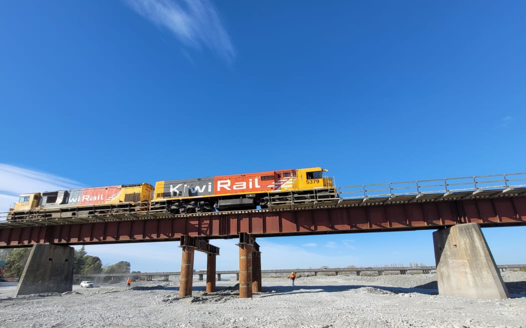A train crossing the Rangitata Rail Bridge on 25 April, 2024, during testing following repairs made after flooding washed away a pier and left the bridge sagging.