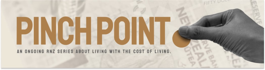 Pinch point: an ongoing RNZ series about living with the cost of living. Hand pinching coin. Bank notes in background.