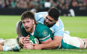 Ireland lock Joe McCarthy reacts after scoring a try against Argentina.