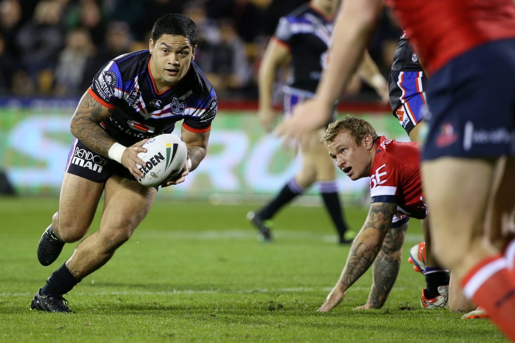 Isaac Luke of the Warriors takes on the Roosters during the NZ Warriors v Roosters at Mt Smart Stadium, on Sunday, 19 June 2016