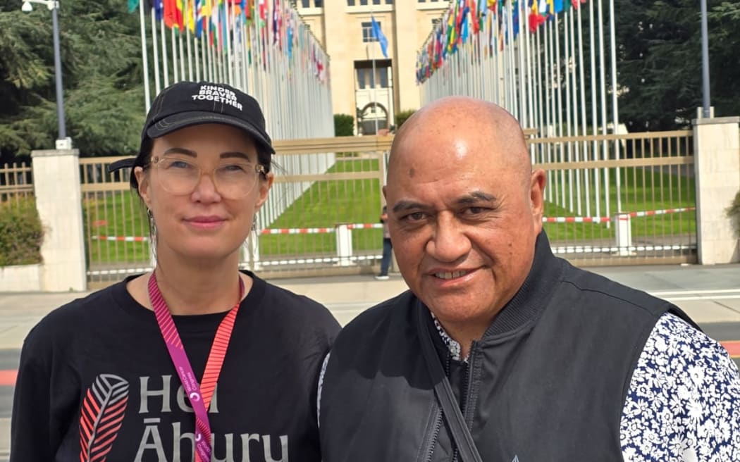 Hei Āhuru Mōwai Board of Trustees co-chair Dr Nina Scott and Hei Āhuru Mōwai Tumuaki Gary Thompson standing in front of the United Nations Building in Geneva.