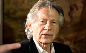 Oscar-winning director Roman Polanski arrives for a press conference after his trial at the regional court in Krakow