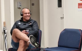 Green Party candidate Efeso Collins hitting the phones.